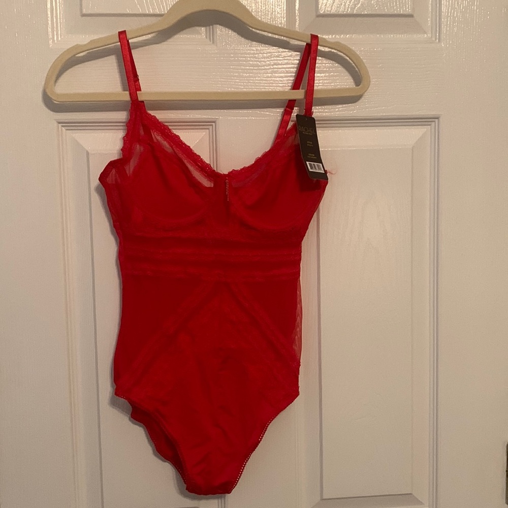 Sexy, lacy body suit. New with tags.